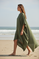 Luxury Resort Kaftan in Muted Olive Mist - Side Walking Pose