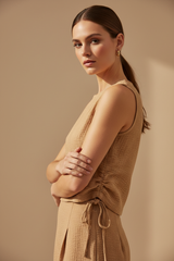 Luxury Sleeveless Crinkle Crop Top in Warm Sand Beige - Editorial Pose