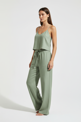 Luxury Minimal Linen Resort Set in Muted Sage Linen - Three Quarter Editorial