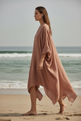 Luxury Resort Kaftan in Dusty Clay Nude - Side Walking Pose