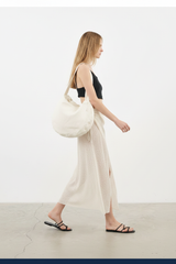 Luxury Beach Wrap Skirt Set in Oatmeal Cream - Side Walking Pose